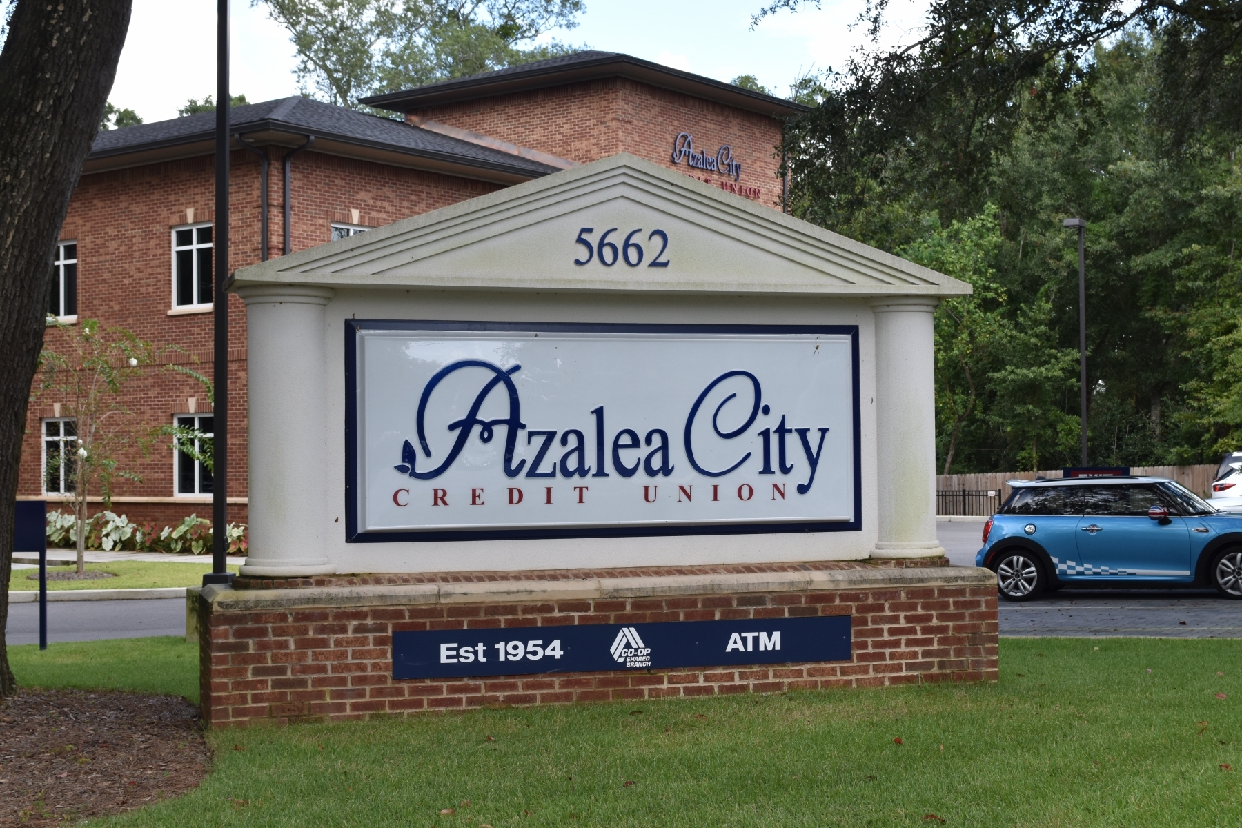 Roy Lewis Construction - azalea city sign
